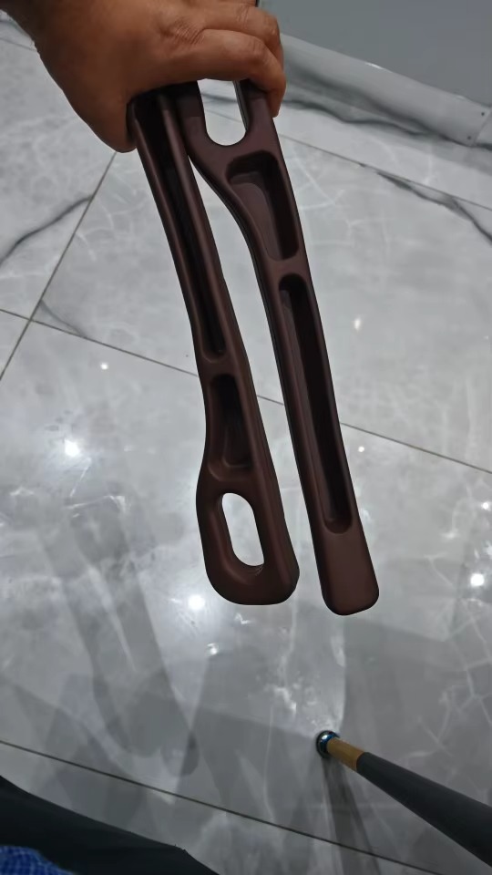 Brown filler held up close