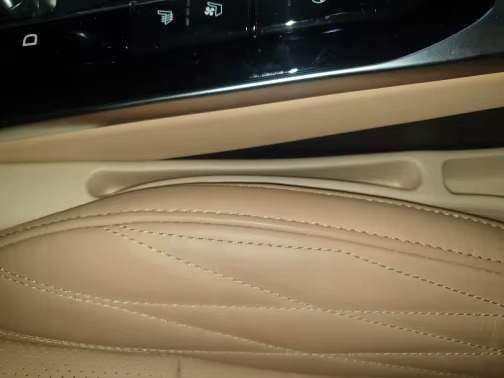 Beige gap filler in luxury BMW interior